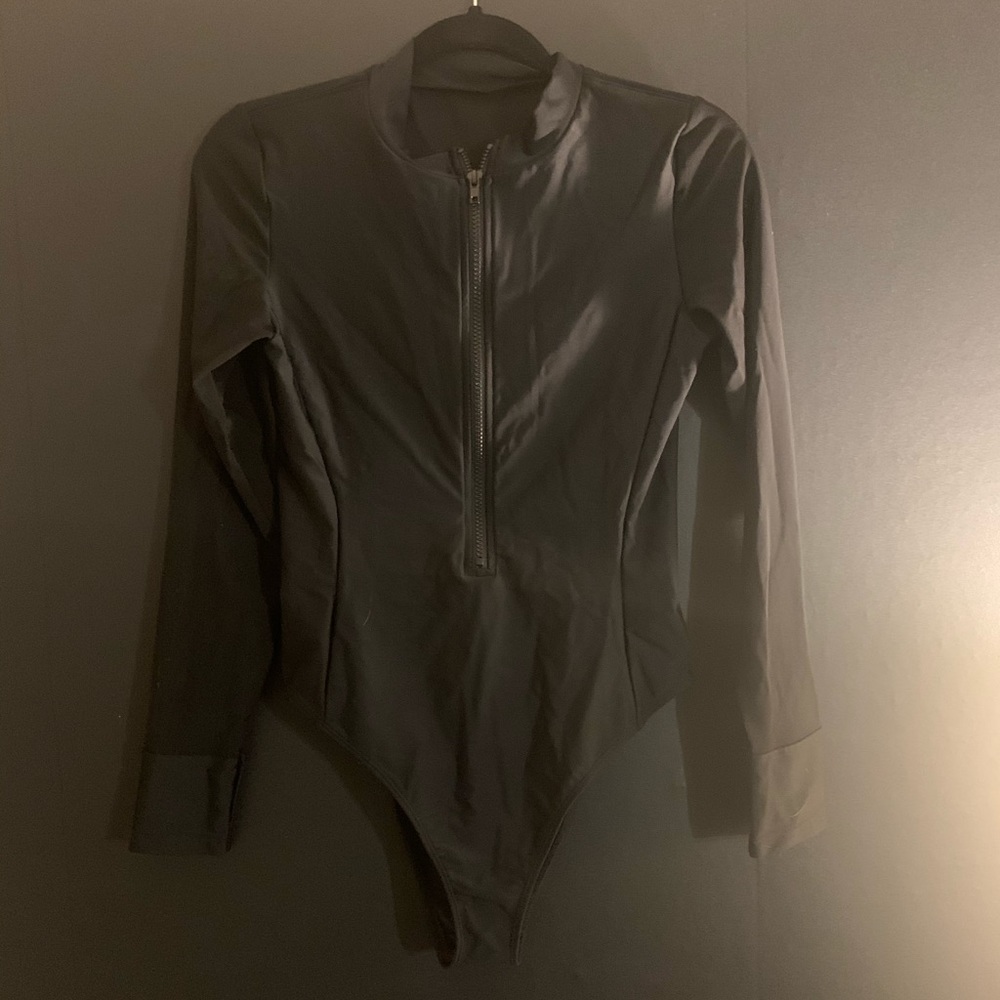 Black long sleeved one piece swimsuit